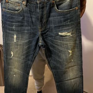 Levi’s 511 distressed dark blue jeans, size W 34 L 32